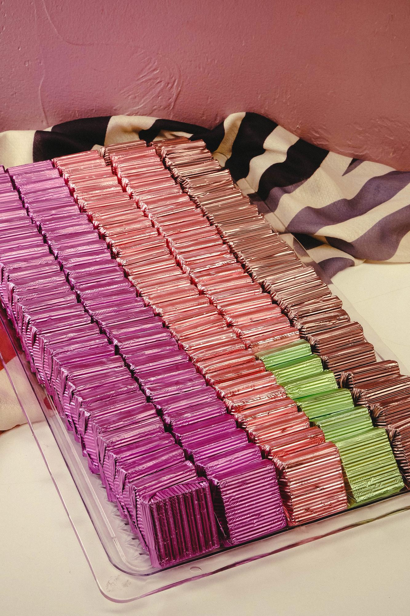 Stack of embroidered samples